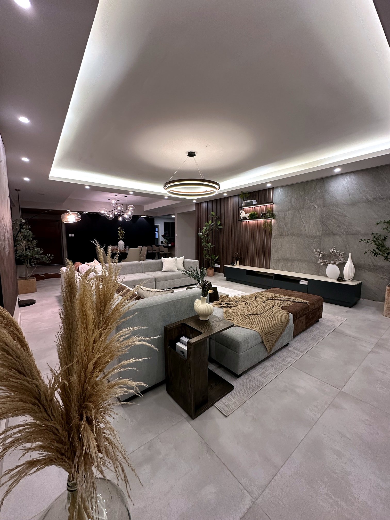 A warm, textured living room designed by Obsidian Urban Design